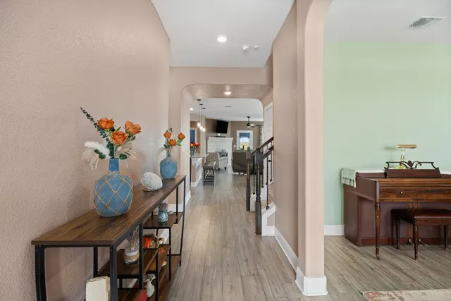 a workspace with furniture and wooden floor