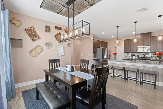 a view of a dining room with furniture