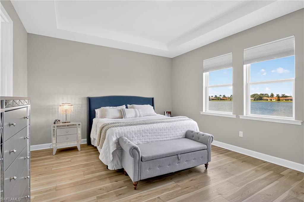 2082 Grove Drive Naples, FL 34120 - Photo 18 of 50 a bedroom with a bed and window