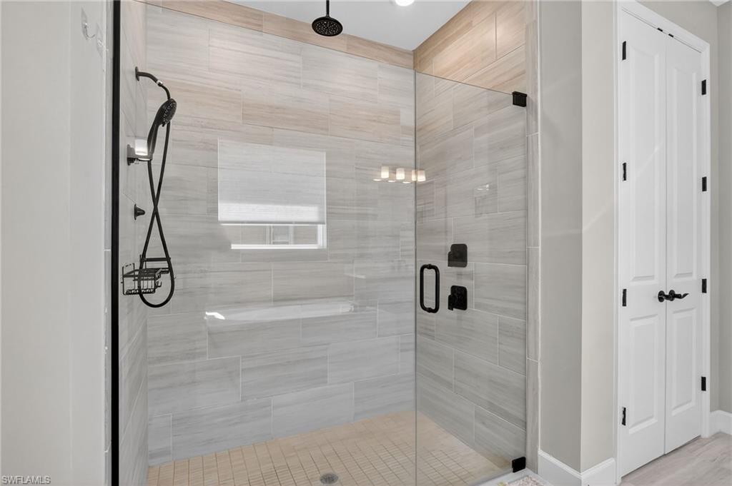 2082 Grove Drive Naples, FL 34120 - Photo 22 of 50 a bathroom with a shower