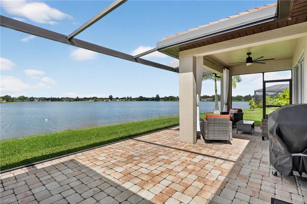 2082 Grove Drive Naples, FL 34120 - Photo 37 of 50 a view of swimming pool with outdoor space and seating area