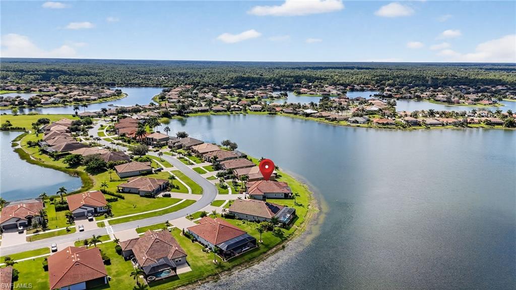 2082 Grove Drive Naples, FL 34120 - Photo 44 of 50 an aerial view of a house with a table and chairs