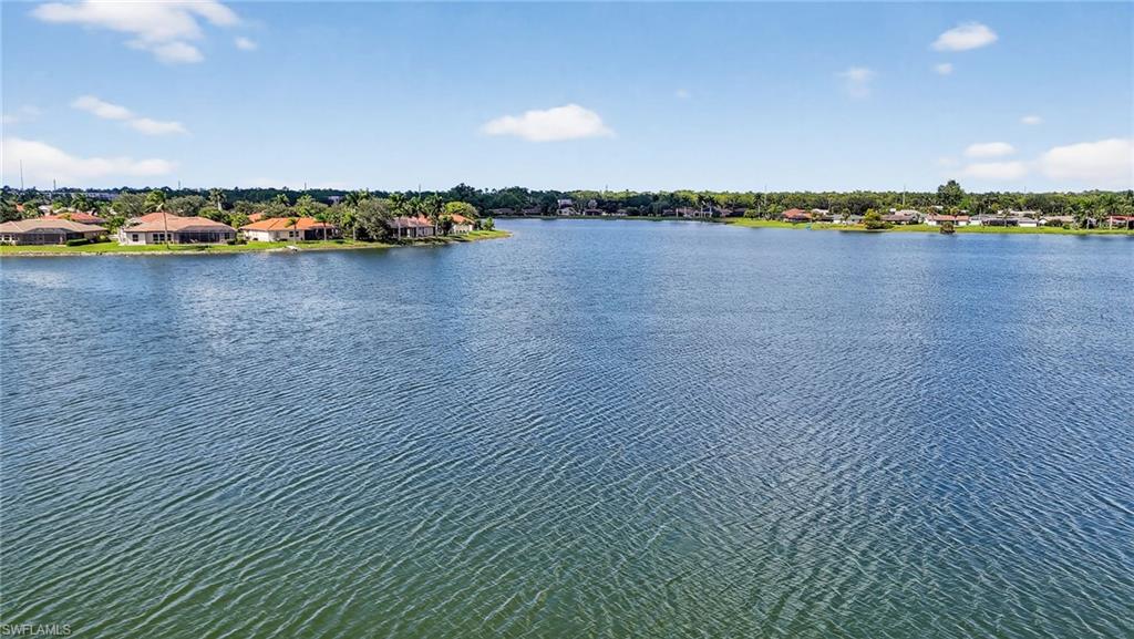 2082 Grove Drive Naples, FL 34120 - Photo 49 of 50 a view of swimming pool and lake view