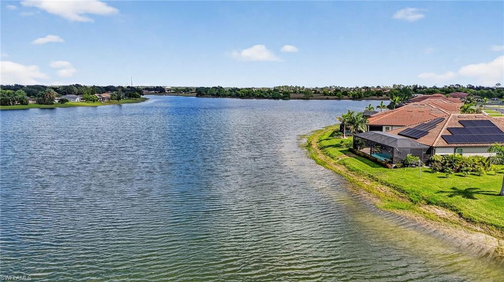 2082 Grove Drive Naples, FL 34120 - Photo 50 of 50 a view of a lake with houses in the back