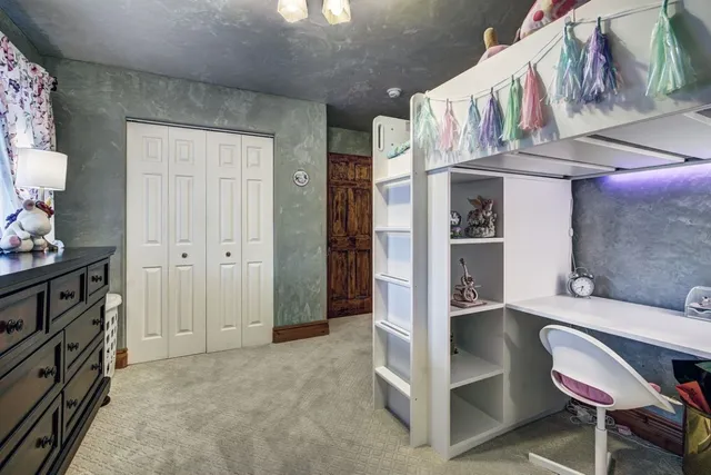 a view of kitchen with cabinets and wooden floor