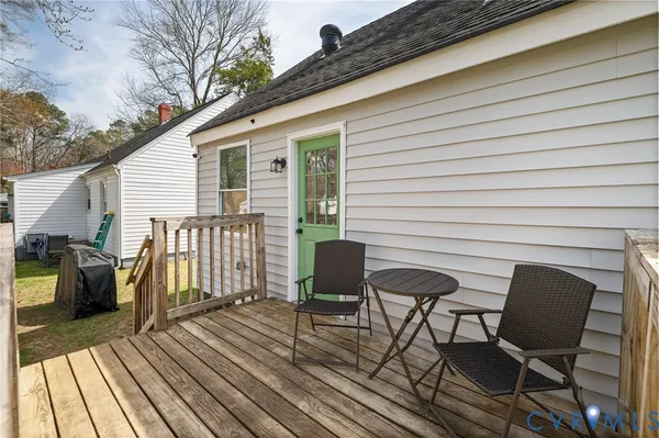 a view of a chairs on the deck