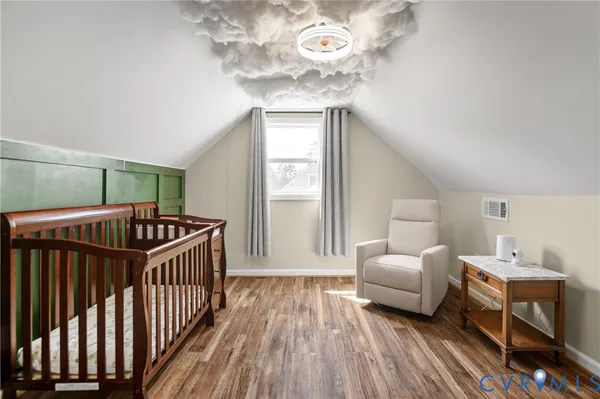 a view of a livingroom with furniture and windows