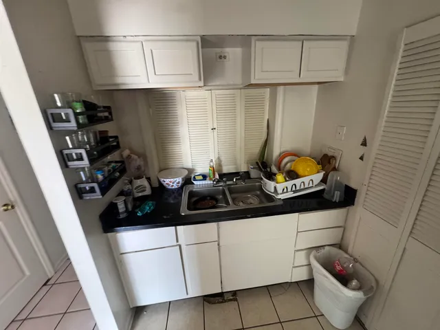 a sink and a cabinets in room