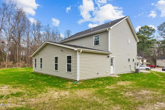 a view of a backyard with a garden