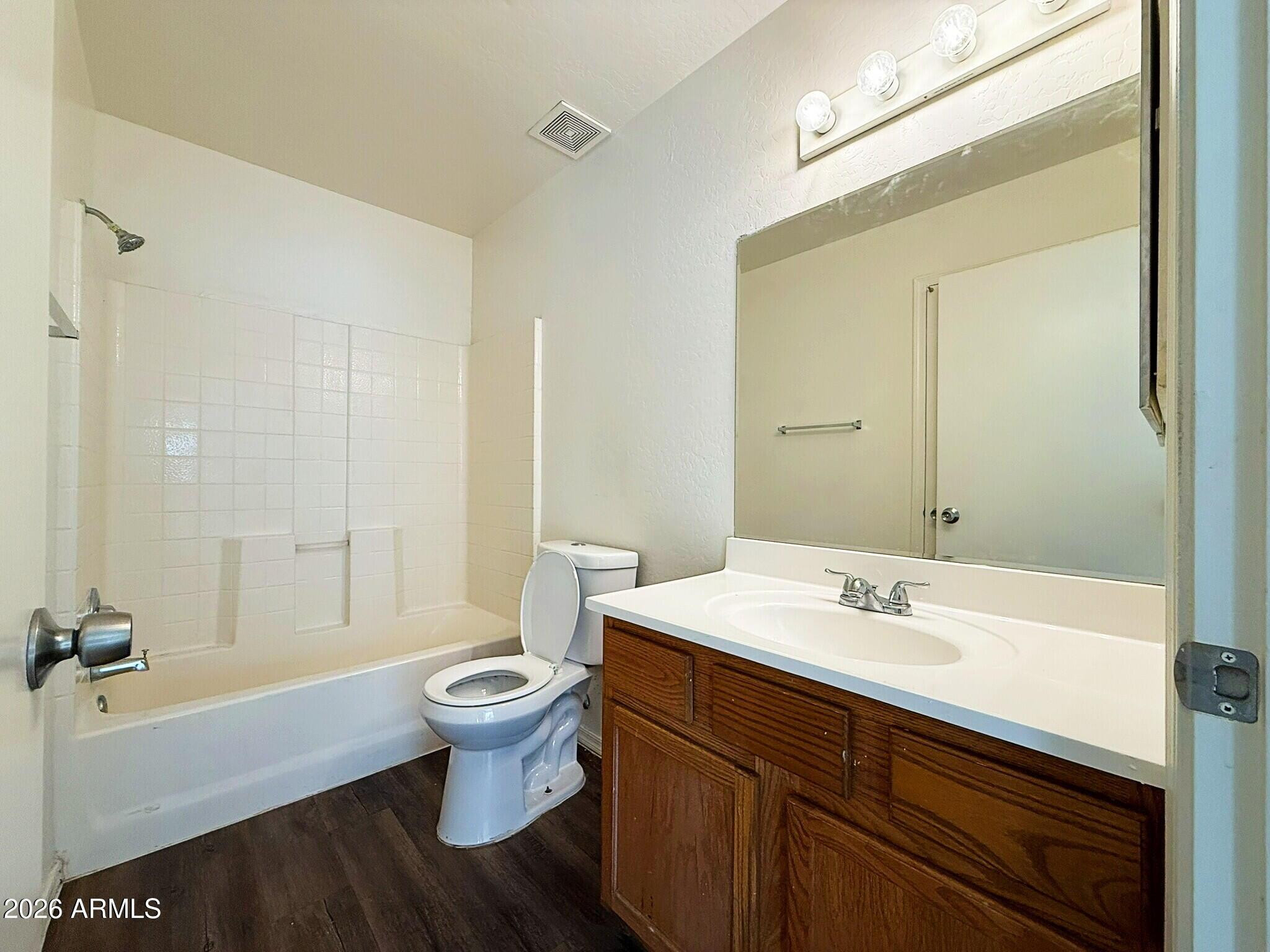 10010 North 7th Avenue, Unit 2 Phoenix, AZ 85021 - Photo 11 of 21 a bathroom with a sink toilet and shower