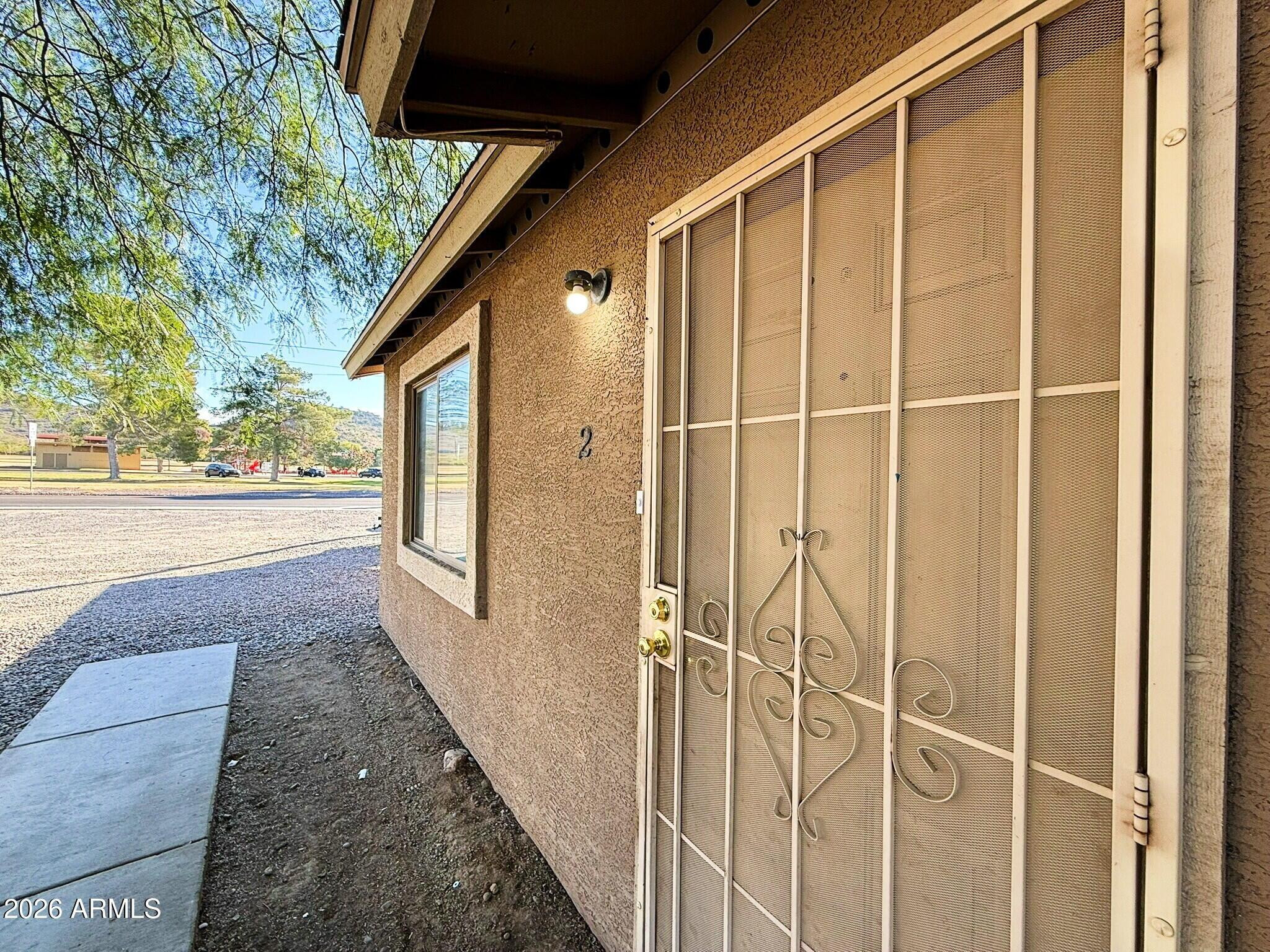 10010 North 7th Avenue, Unit 2 Phoenix, AZ 85021 - Photo 2 of 21 a view of a porch