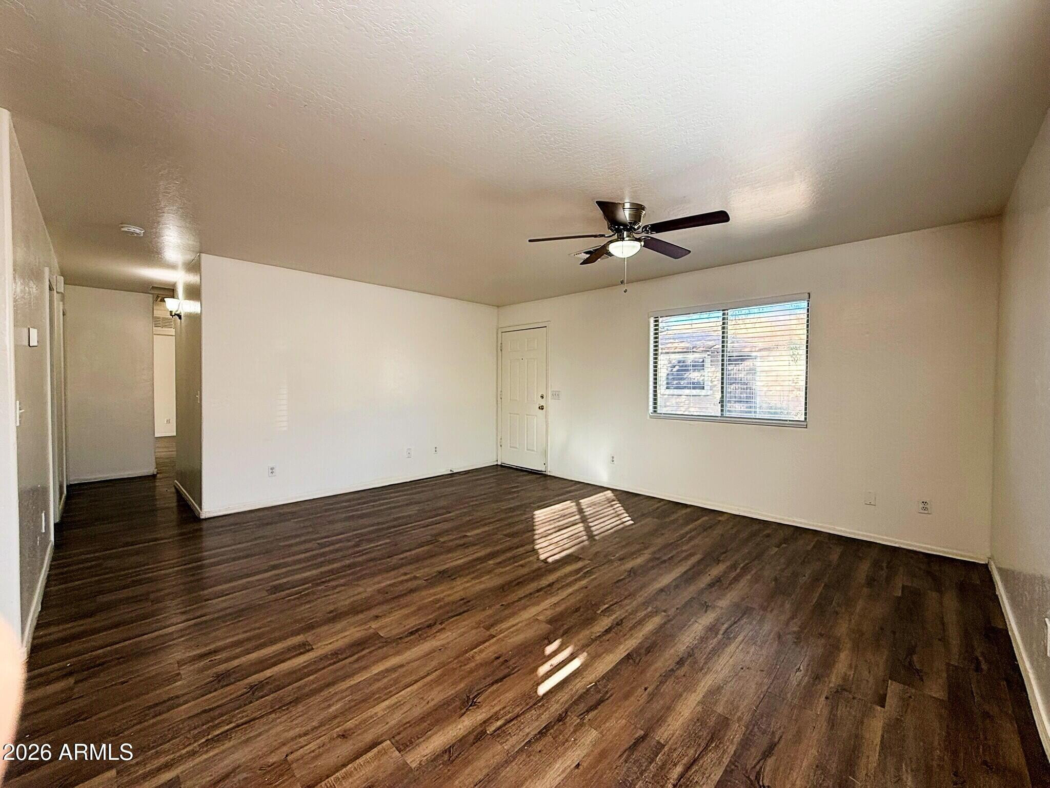 10010 North 7th Avenue, Unit 2 Phoenix, AZ 85021 - Photo 5 of 21 wooden floor in an empty room