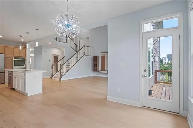 a view of a big room with closet and windows