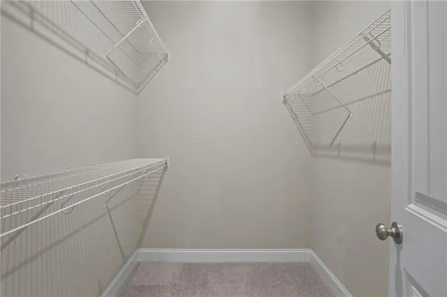 an empty room with windows and window