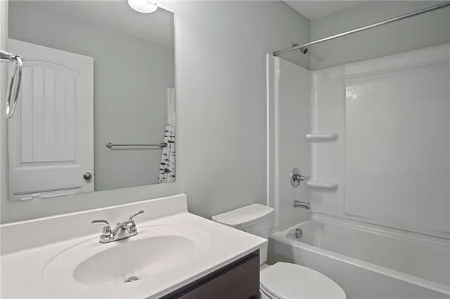 a view of a wooden deck with a bench