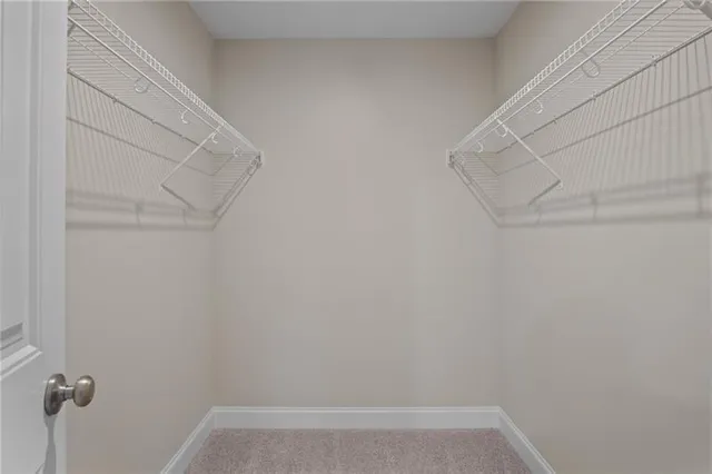 a front view of house with yard and outdoor seating