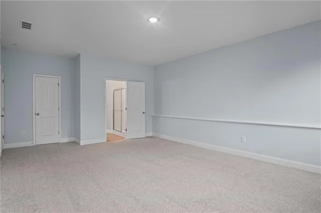 a view of a swimming pool with an outdoor space and seating area