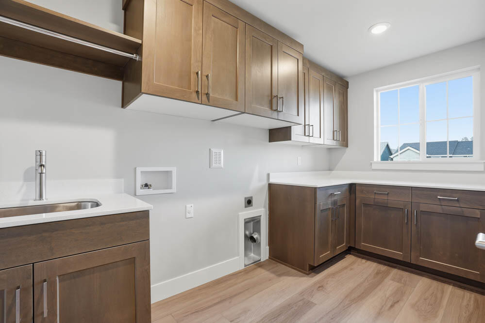 60943 Southeast Apollo Place Bend, OR 97702 - Photo 13 of 21 laundry room