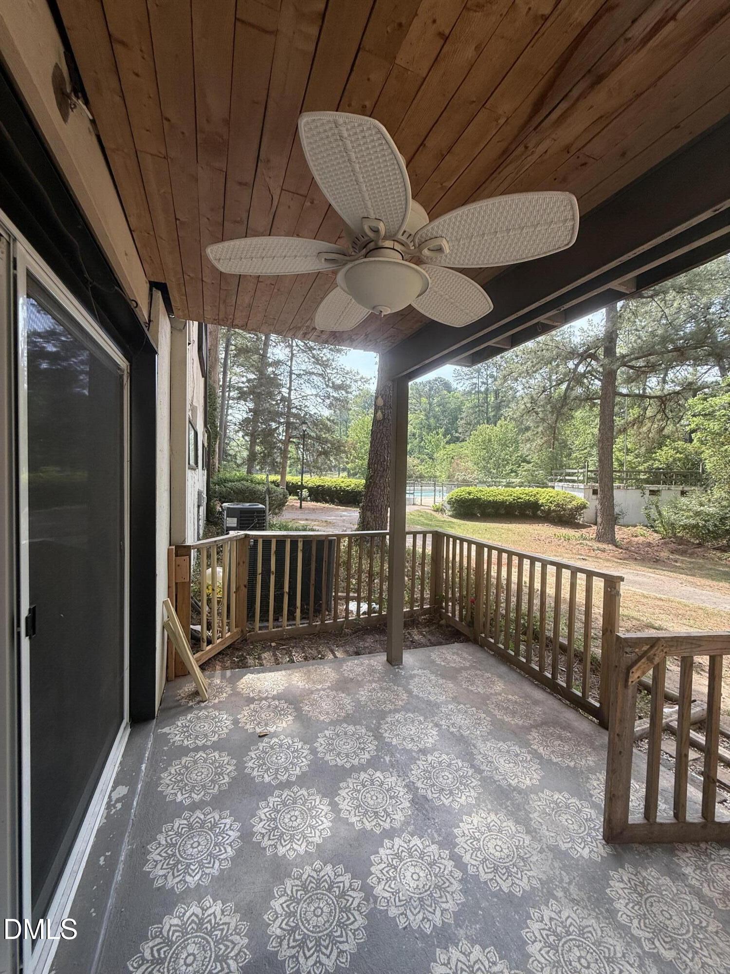 546 Pine Ridge Place Raleigh, NC 27609 - Photo 20 of 28 a view of a porch with wooden floor