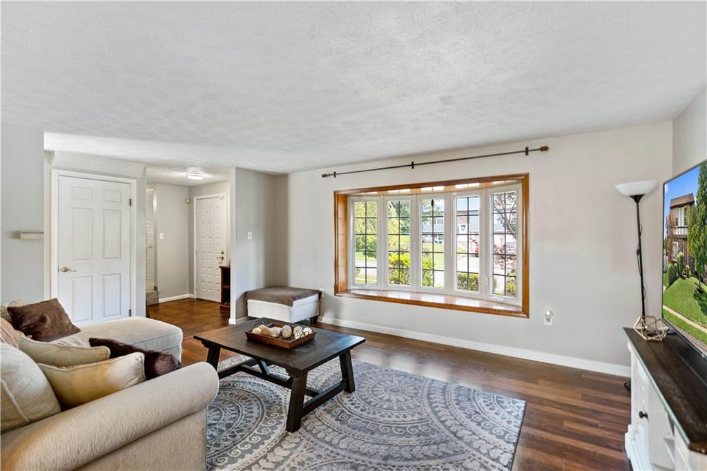 320 Celestial Drive Freedom, PA 15042 - Photo 11 of 28 a living room with furniture and a window