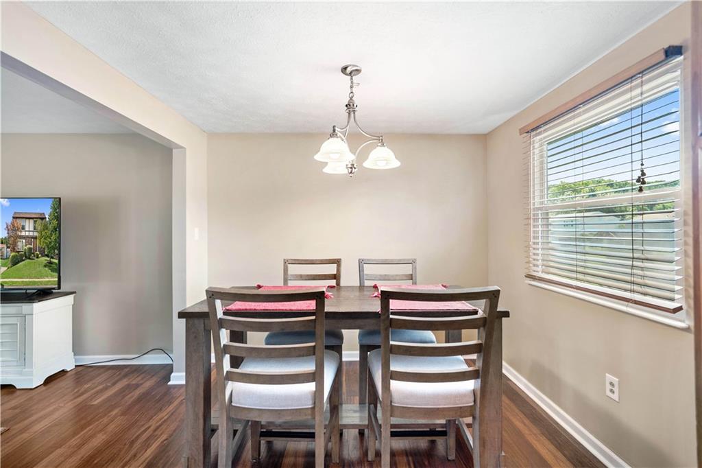 320 Celestial Drive Freedom, PA 15042 - Photo 15 of 28 a view of a dining room with furniture window and wooden floor