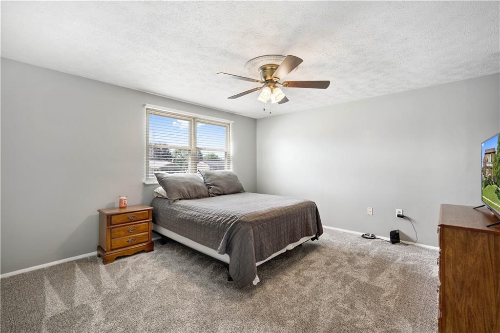 320 Celestial Drive Freedom, PA 15042 - Photo 19 of 28 a bedroom with a bed and window