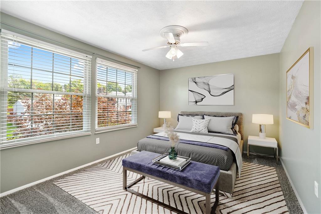 320 Celestial Drive Freedom, PA 15042 - Photo 25 of 28 a bedroom with a bed and a window