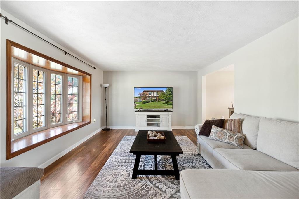 320 Celestial Drive Freedom, PA 15042 - Photo 9 of 28 a living room with furniture and a large window
