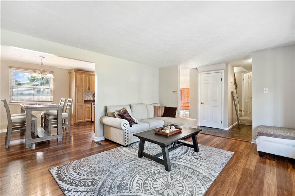 320 Celestial Drive Freedom, PA 15042 - Photo 10 of 28 a living room with furniture and a rug