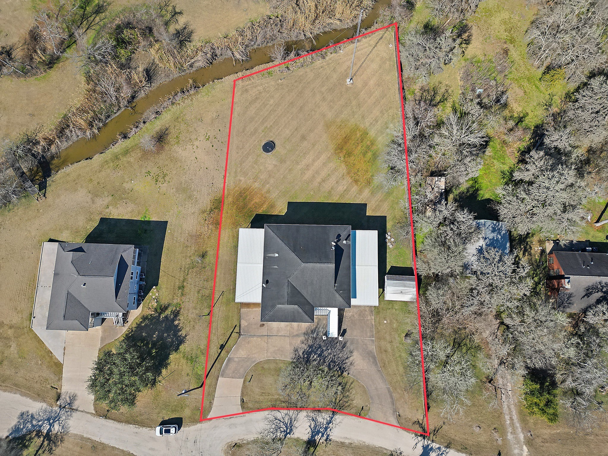 1306 Spring Branch Drive Baytown, TX 77523 - Photo 7 of 38 view of a house with a yard