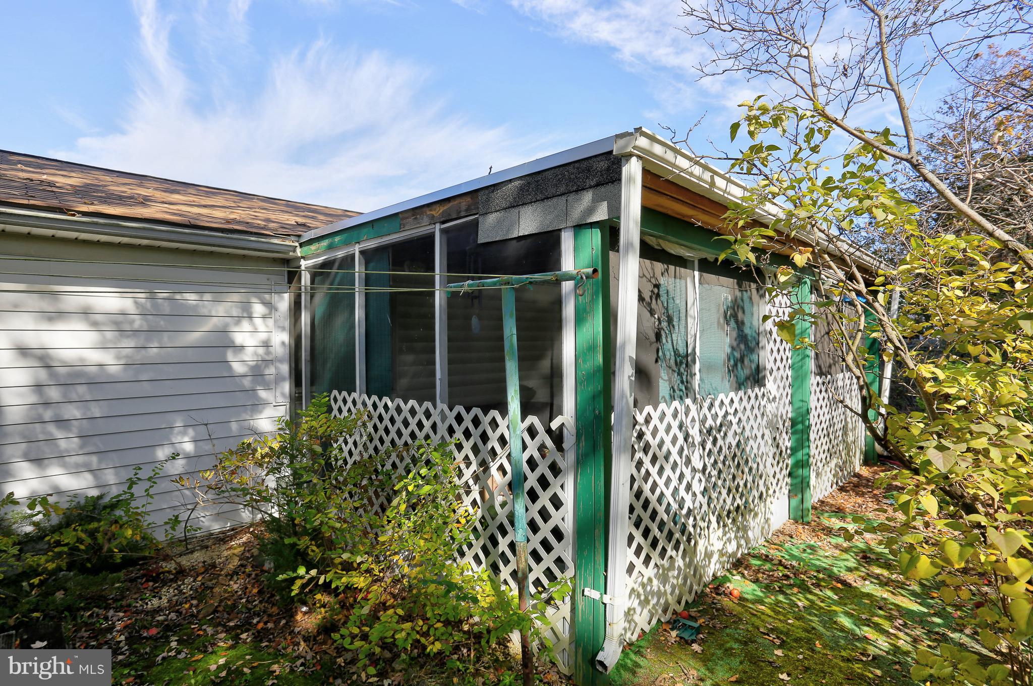 7141 Fairbrook Road Baltimore, MD 21244 - Photo 26 of 28 Rear Enclosed Patio