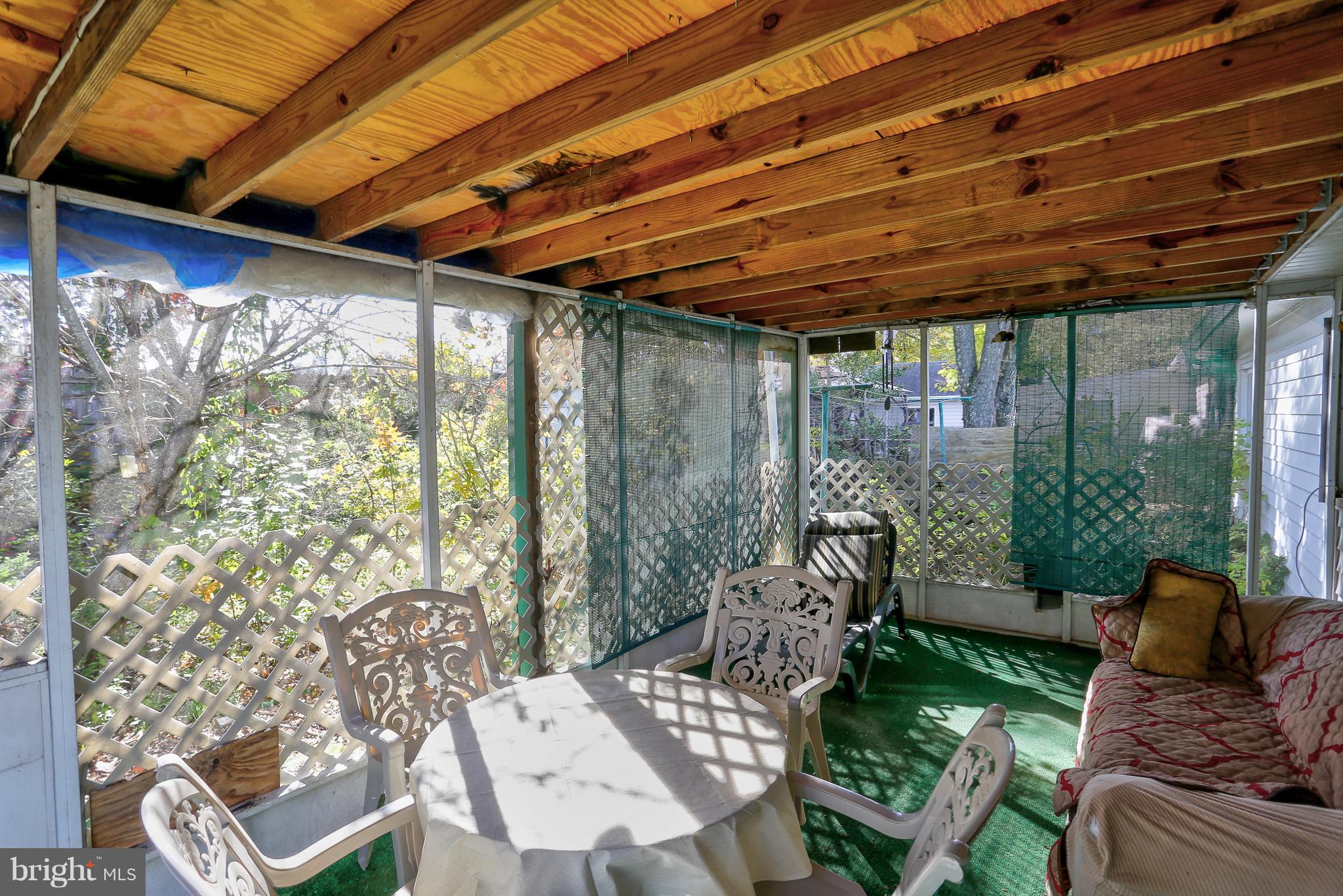 7141 Fairbrook Road Baltimore, MD 21244 - Photo 28 of 28 Rear Enclosed Patio