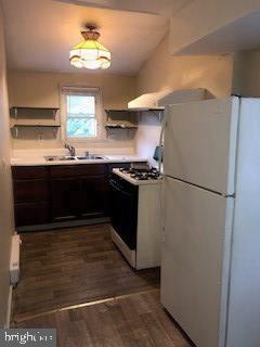 903 Wagontown Road Coatesville, PA 19320 - Photo 6 of 12 a kitchen with stainless steel appliances granite countertop a refrigerator a sink dishwasher a stove and a refrigerator