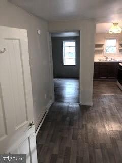 903 Wagontown Road Coatesville, PA 19320 - Photo 8 of 12 a view of entryway and hall with wooden floor