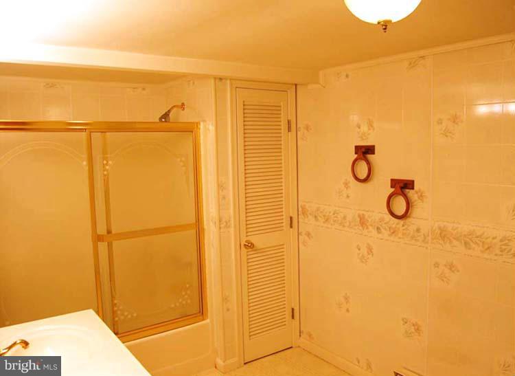 38141 Dukeharts Coltons Point, MD 20626 - Photo 20 of 25 a bathroom with a shower