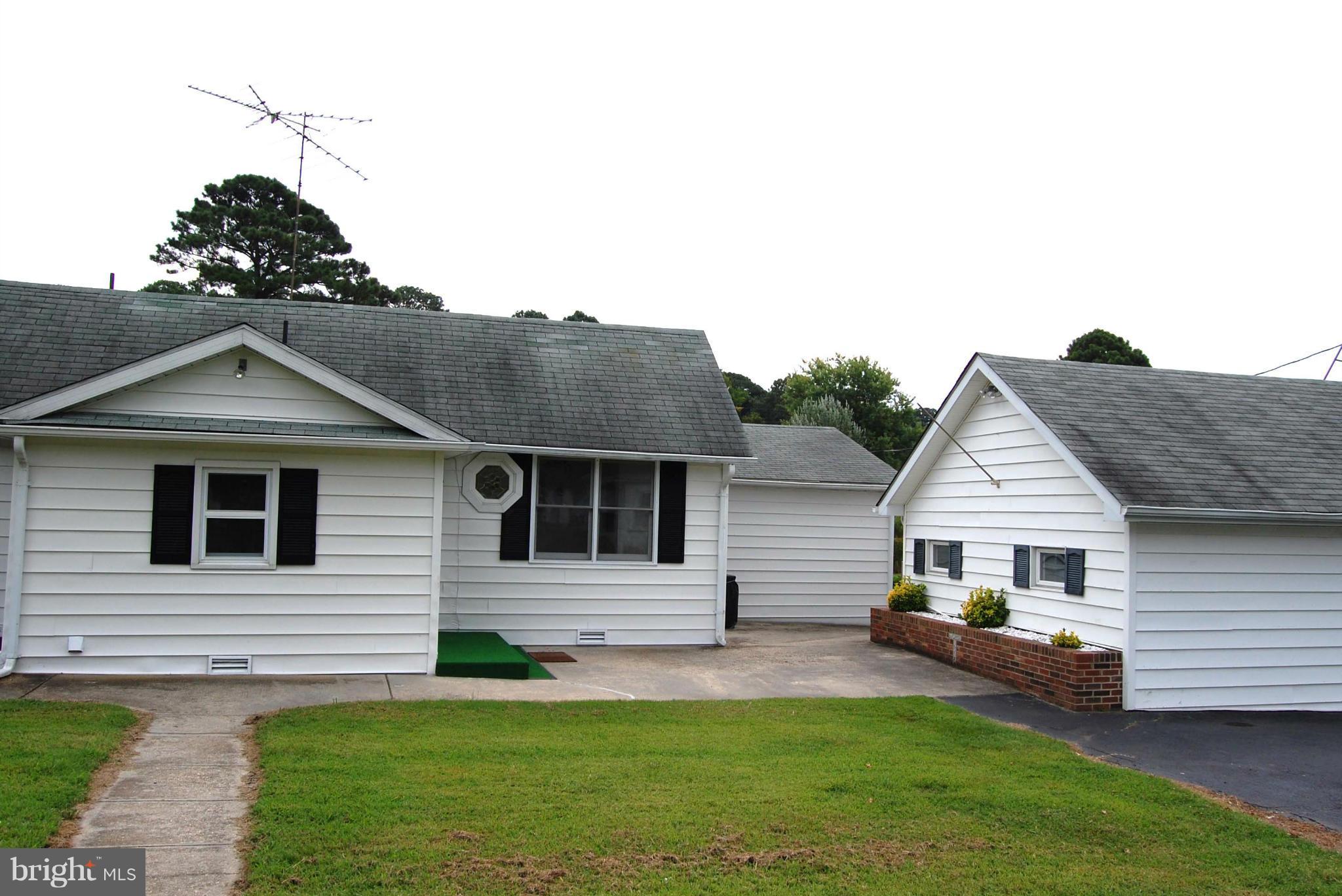 38141 Dukeharts Coltons Point, MD 20626 - Photo 3 of 25 a front view of a house with a yard