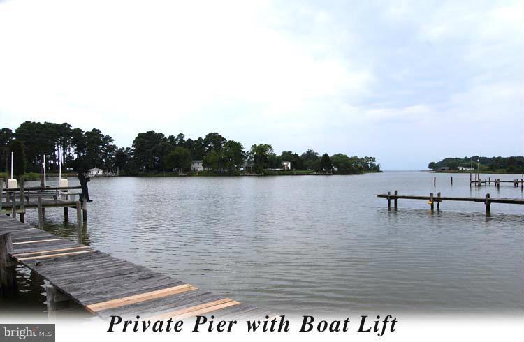 38141 Dukeharts Coltons Point, MD 20626 - Photo 25 of 25 a view of a lake with a sitting space