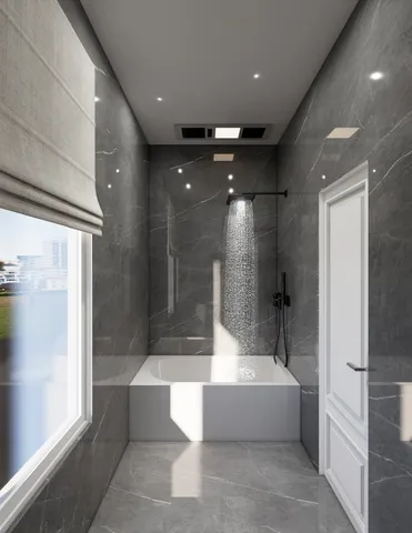 a bathroom with a bathtub and a shower