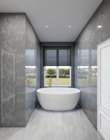 a bathroom with a bathtub and shower