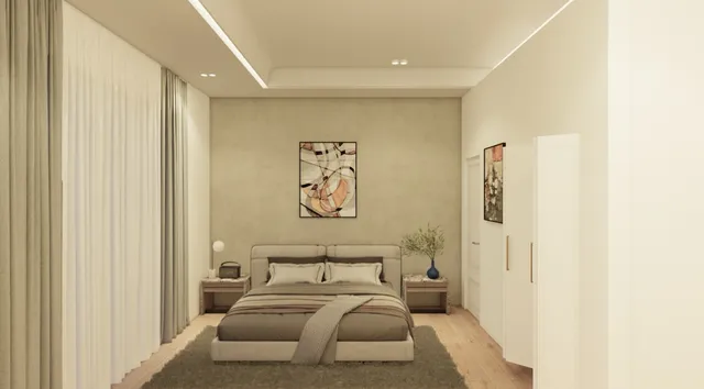 a bedroom with a bed and a mirror