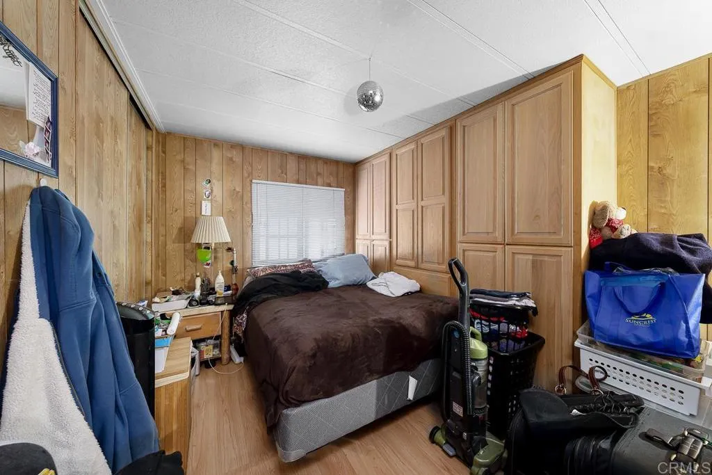11949 Riverside Drive, Unit 133 Lakeside, CA 92040 - Photo 24 of 32 a bedroom with furniture and a window