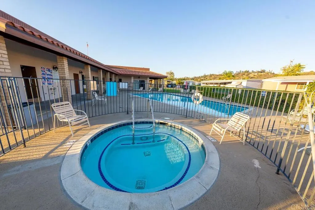 11949 Riverside Drive, Unit 133 Lakeside, CA 92040 - Photo 30 of 32 a view of swimming pool with outdoor seating