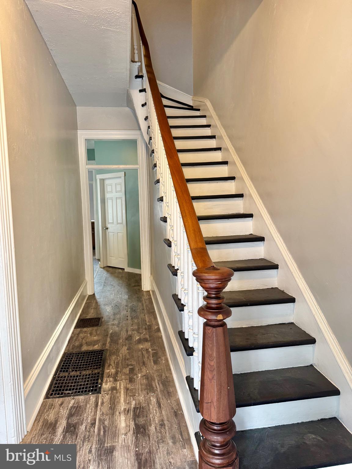 622 Washington Avenue Tyrone, PA 16686 - Photo 2 of 25 a view of staircase with wooden floor and white walls