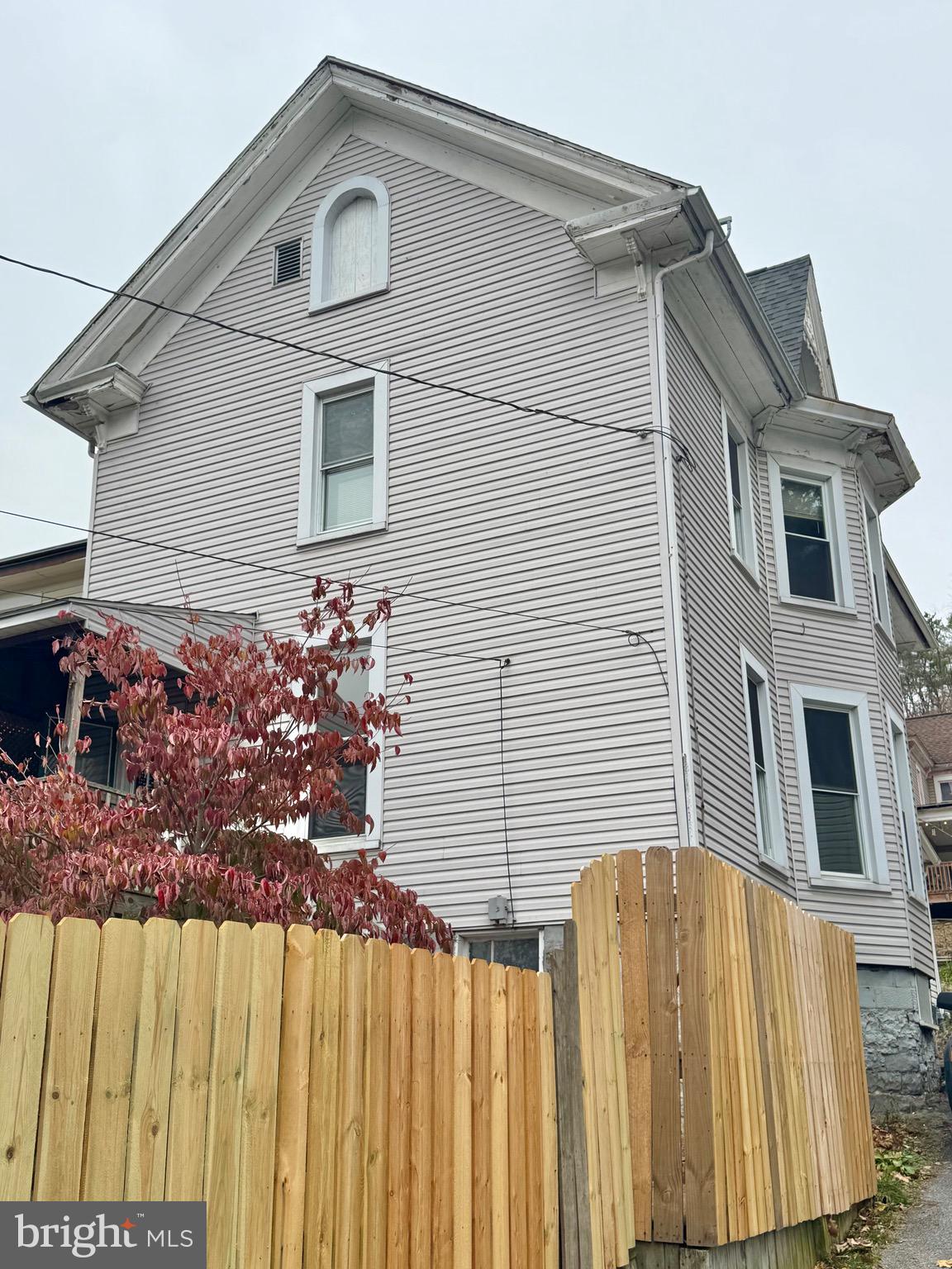 622 Washington Avenue Tyrone, PA 16686 - Photo 22 of 25 a front view of a house with a yard