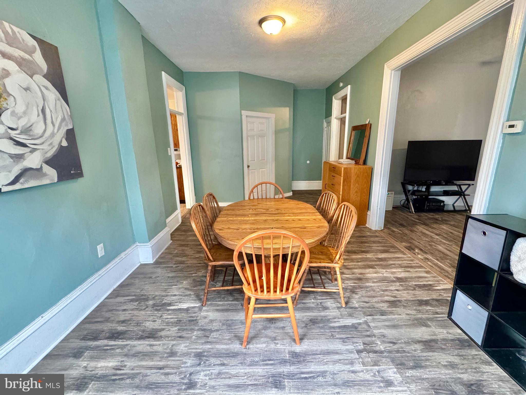 622 Washington Avenue Tyrone, PA 16686 - Photo 5 of 25 a dining room with furniture and wooden floor