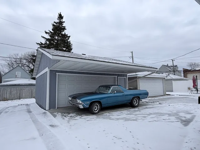 a car parked in front of a house