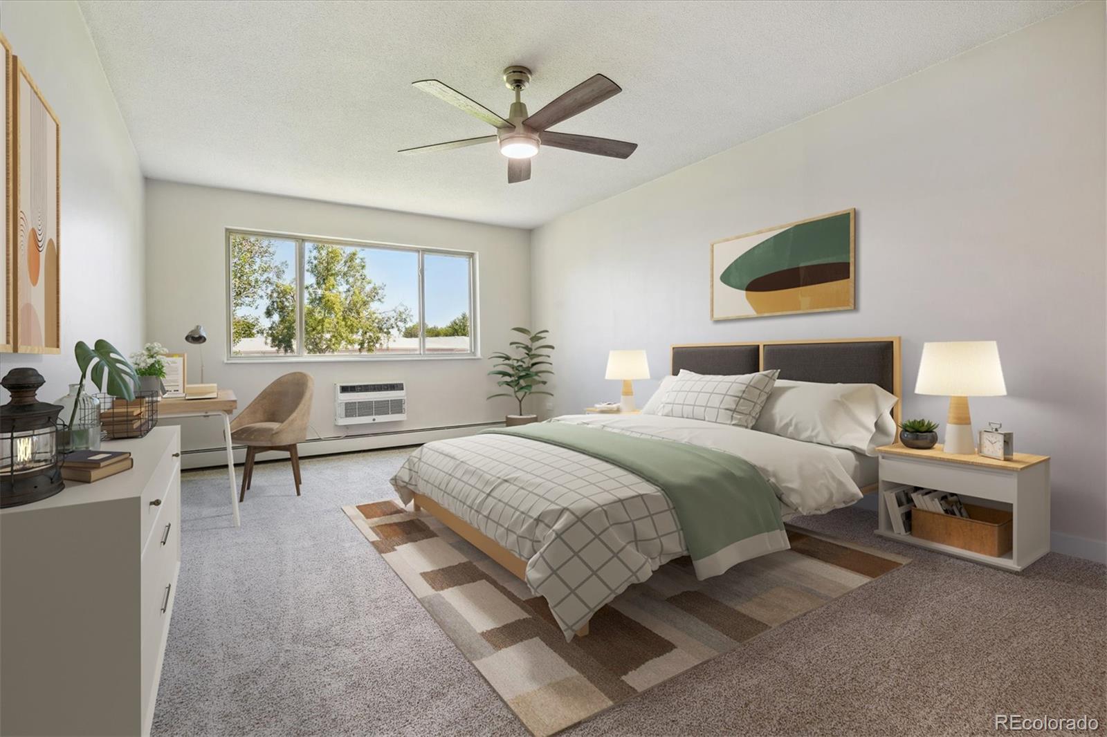 715 South Alton Way, Unit 5A Denver, CO 80247 - Photo 11 of 49 a bed room with a bed and a chair