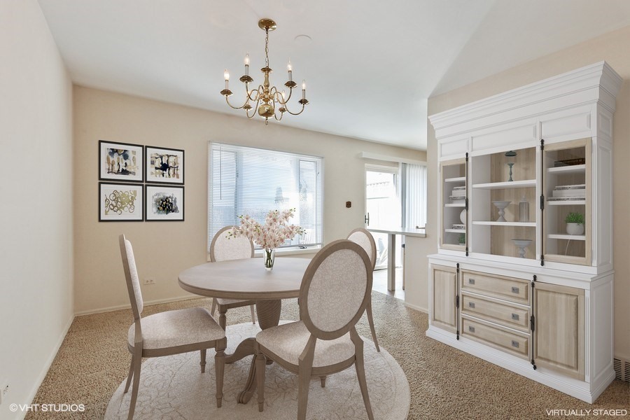 829 Hibbard Road Wilmette, IL 60091 - Photo 3 of 12 a dining room with furniture and window