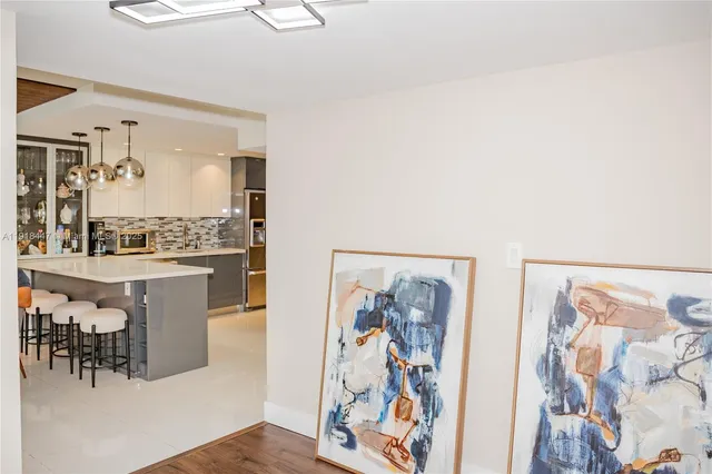 a view of a living room with furniture and decor