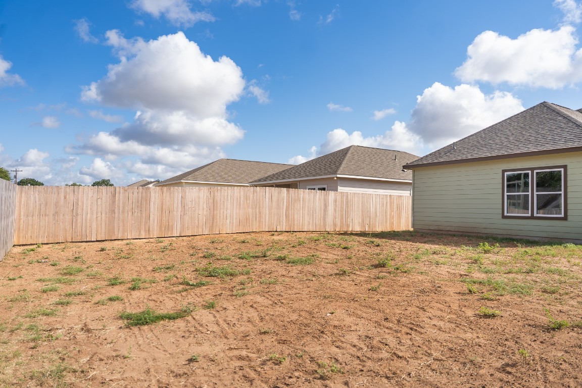 305 String Prairie Way Smithville, TX 78957 - Photo 25 of 26 View of fenced backyard